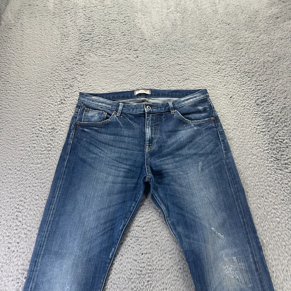 Pantalones de mezclilla Uniqlo con ribete para hombre 34x29 azul pierna recta desteñido elástico ropa de trabajo Foto 2 de 4