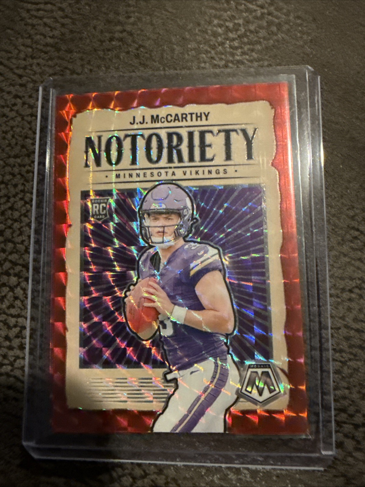2024 Panini Mosaic J.J. McCarthy SP Notoriety Rookie Red Prizm RC #21 Vikings