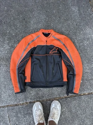 orange and black Alpinestars leather motorcycle jacket Black Label MEDIUM - image 1 of 4