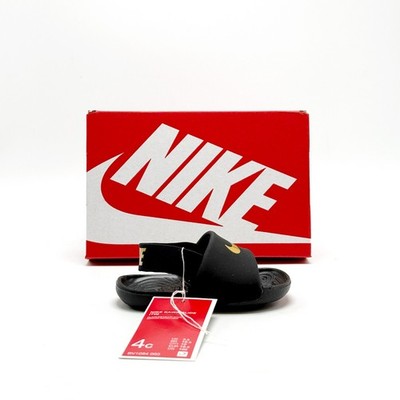 nike gold swoosh slides