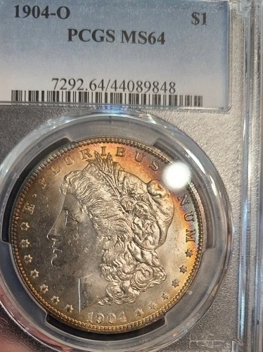 1904-O Rainbow toned Morgan Silver Dollar PCGS MS64 Nice Color