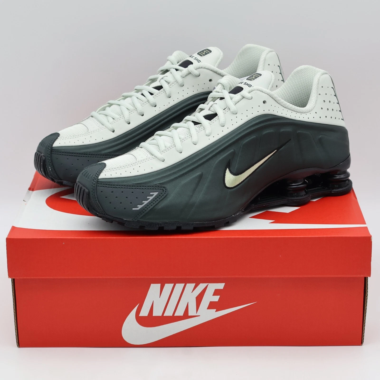 HQ1988-300 Nike Shox R4 Black Spruce Spruce Aura Black Olive Aura (Men's)
Opens in a new window or t