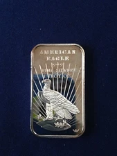 1984 World Wide Mint American Eagle MM on right WWM-109V1 Silver Art Bar P1311