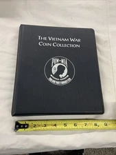 The Vietnam War Coin Collection Book, 32) Kennedy Half Dollars