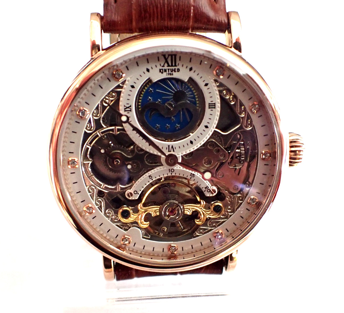 Montre squelette automatique Kinyued avec phase de lune, le cadeau idéal pour homme