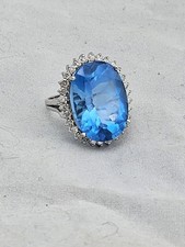 14K White Gold Ring 13.47 Grams Has Blue Stone & 30 Round Diamonds