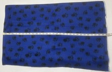 NEW Fleece fabric by the piece - Black Paw Prints on Blue - 58 Wide By 65 Long