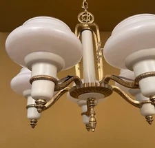 Vintage Lighting  1930s brass chandelier. Glass shades.