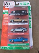 AUTO WORLD 1/64 DELUXE 4-PACK TARGET EXCLUSIVE PONTIAC CHEVY FORD  MERCURY NEW