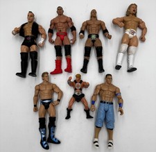 Lot Of 7 WWE Action Figues Vintage Collectible See Pictures