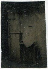 BABY WITH DARK HAIR. TINTYPE.