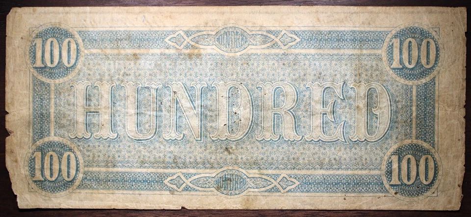 1864 $100 Confederate States Of America Holed Note Circulated P131 - Image 2 of 2