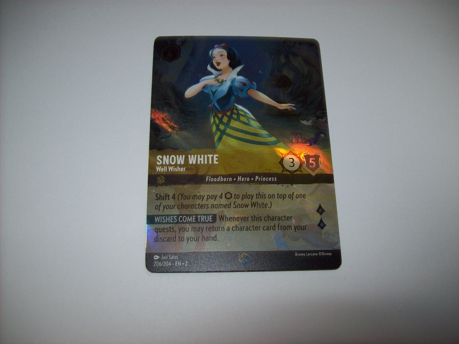 Snow White - Well Wisher 2023 Rise of the Floodborn #206/204 Enchanted  (Alternate Art) Price Guide - Sports Card Investor