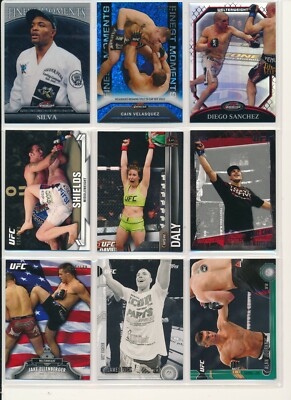 TOPPS UFC TRADING CARD LOT OF (9) NUMBERED CARDS JUST AS