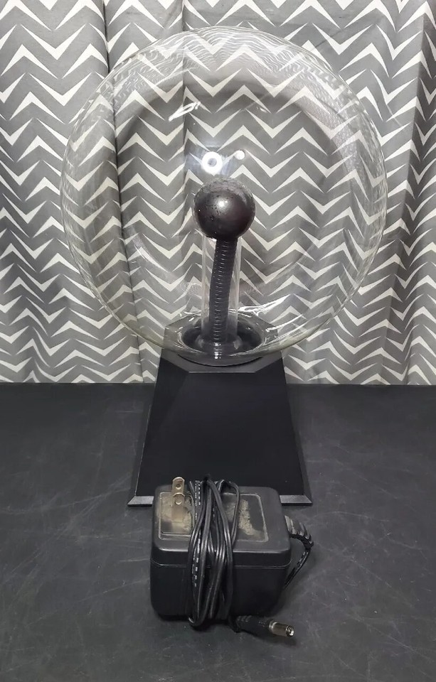 A classic 8" vintage plasma ball that still works — the OG electric desk toy that makes every office feel like a mad scientist's lair.