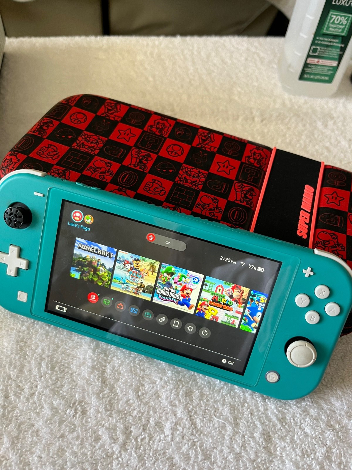 Nintendo Switch Lite Works perfectly + Mario case 32GB Console - Turquoise