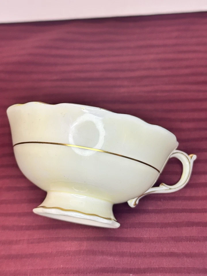 2 tazas de té de porcelana de hueso garantizadas Paragon Dbl SOLO amarillas y doradas RARAS de colección Foto 3 de 4