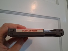 BUBBLE BOBBLE NES GAME CARTRIDGE W/ MANUAL UNTESTED TAITO