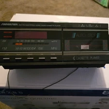 SoundDesign 3838WAL  AM/FM Radio Cassette Player Alarm Clock Wood Grain Box