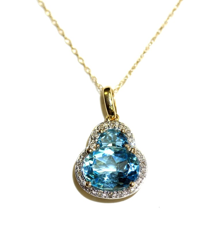14k yellow gold .10ct diamond oval shaped blue topaz pendant necklace 2.2g 18"