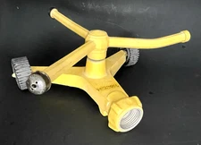 NELSON 3-Arm Spinning Rotating Metal LAWN SPRINKLER Yellow w 2-Wheels VINTAGE