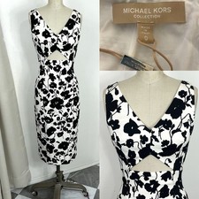 Michael Kors NWOT Size 0 Black And White Floral Cut Out Dress. Fully Lined.