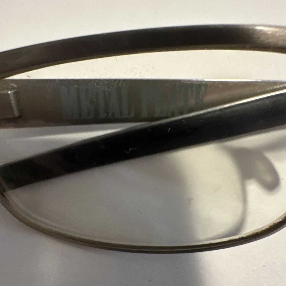 Marco de gafas Oakley 22-199 de segunda mano con placa de metal cromado cepillado 53-18-140 Foto 2 de 4