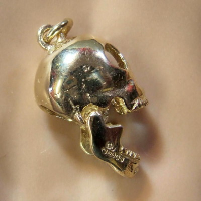 9ct gold new movable skull pendant or 