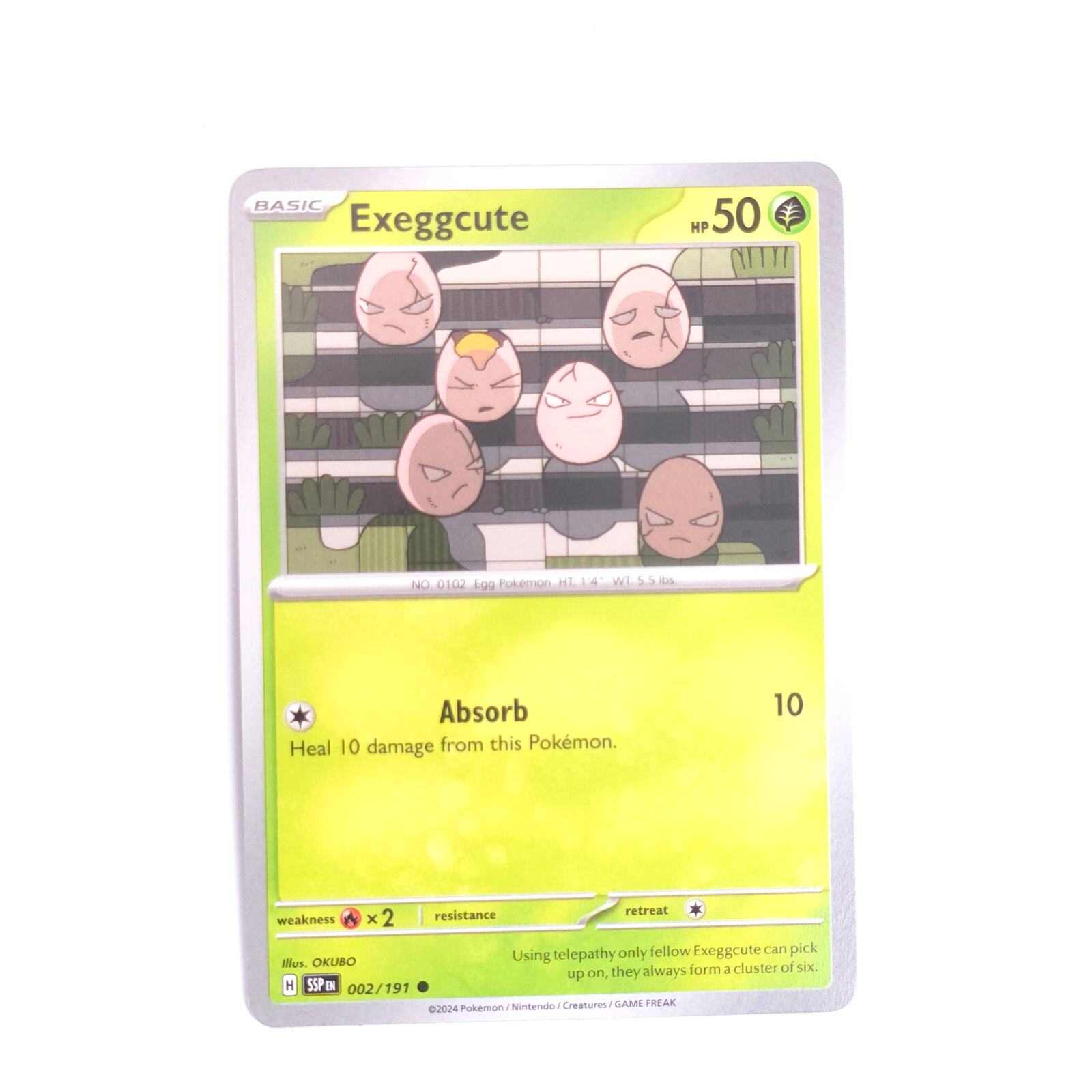 Exeggcute 002/191 Pokemon SV08: Surging Sparks Common NM
