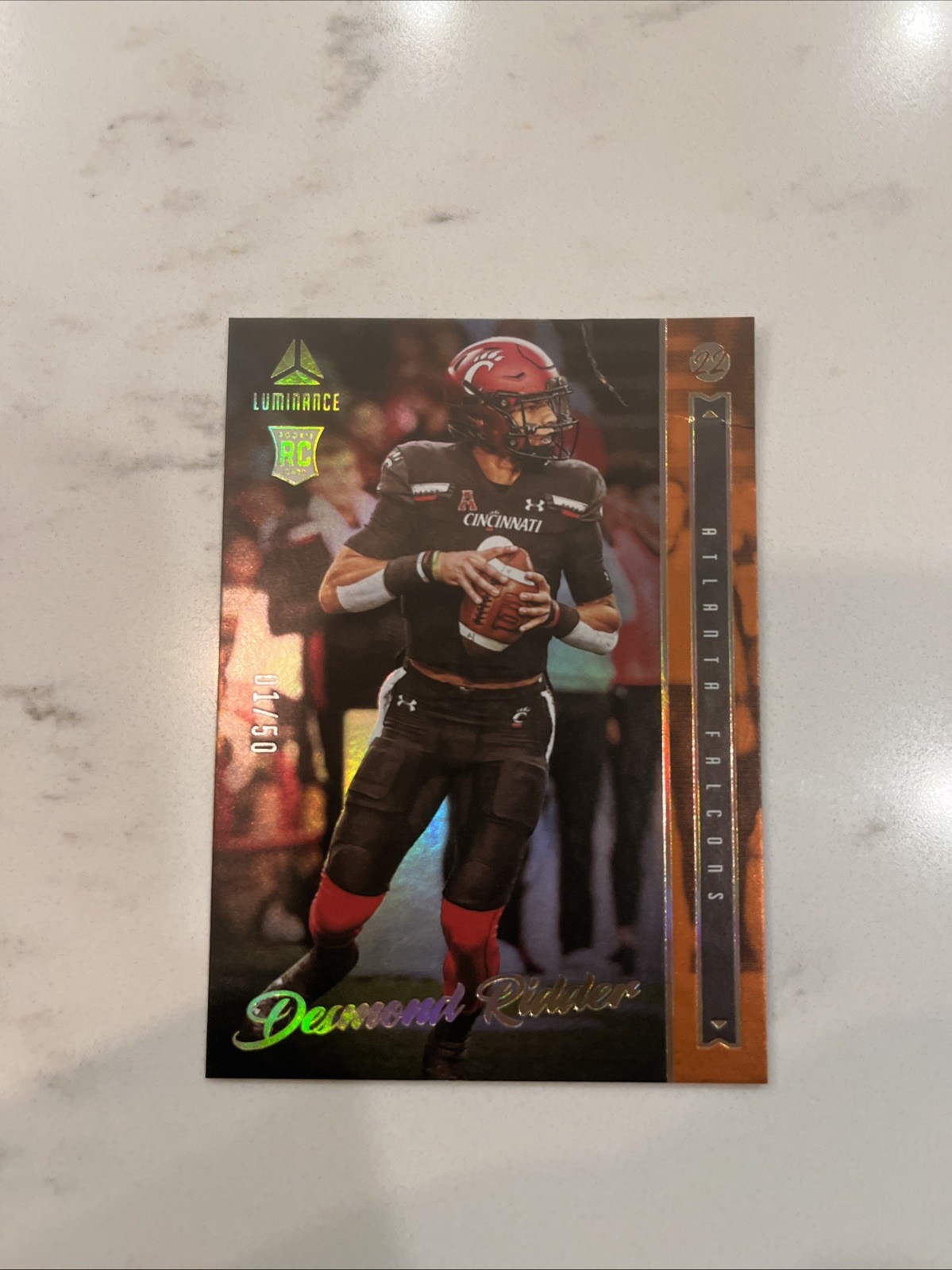 2022 Panini Luminance - Rookie Desmond Ridder #102 Orange /50 (RC)