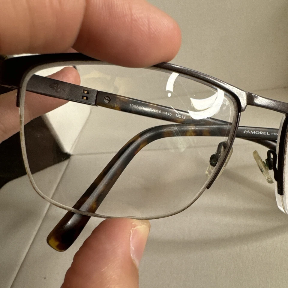Armação de óculos óptica OGA Morel 10089O marrom MD12 semi aro metal 57-19-145 - Imagem 3 de 4