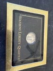 Standing Liberty Quarter In A Display Case