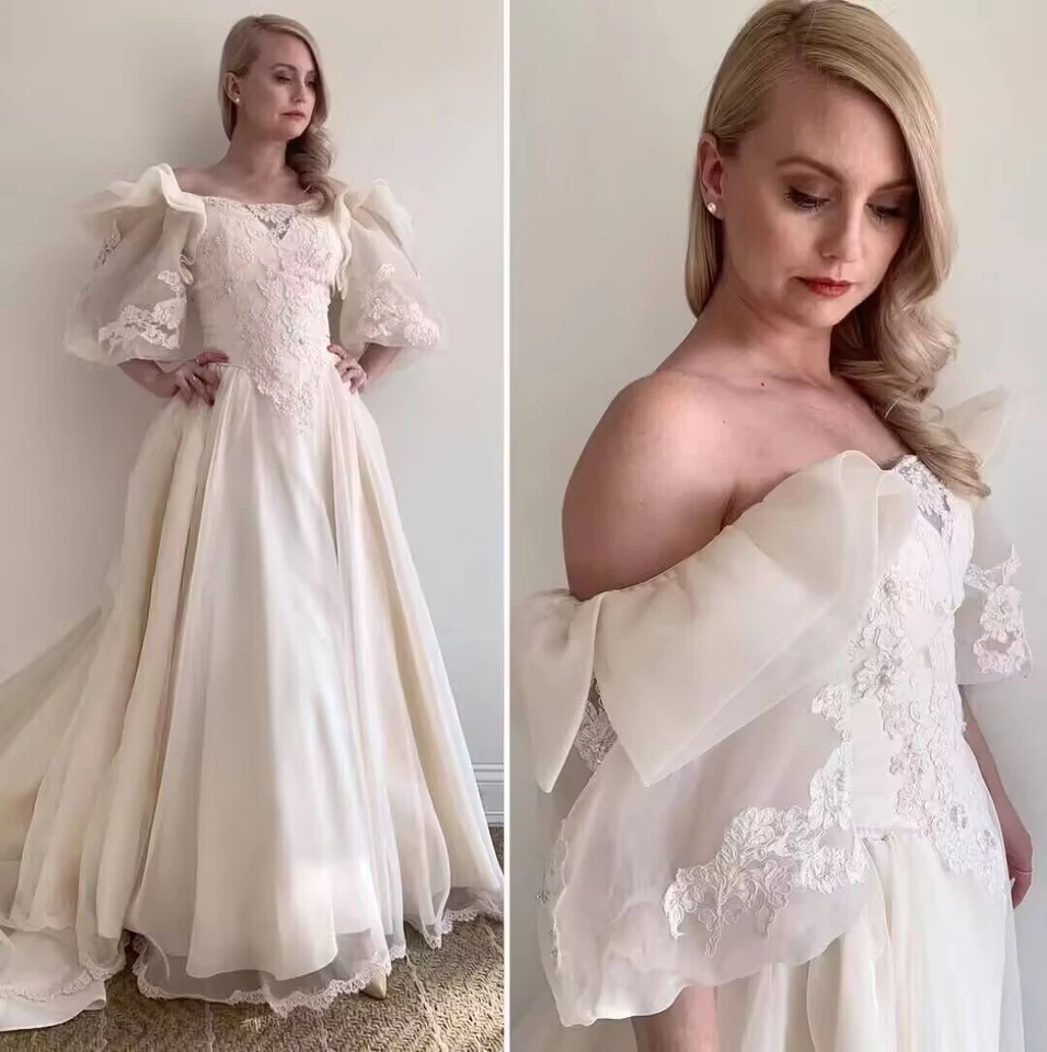 Vestidos de novia clásicos de la década de 1960 beige vintage mangas abullonadas línea A Foto 2 de 4