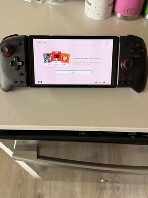 Nintendo Switch OLED Black With Nintendo Headset, SD Card, Charger, And Case
