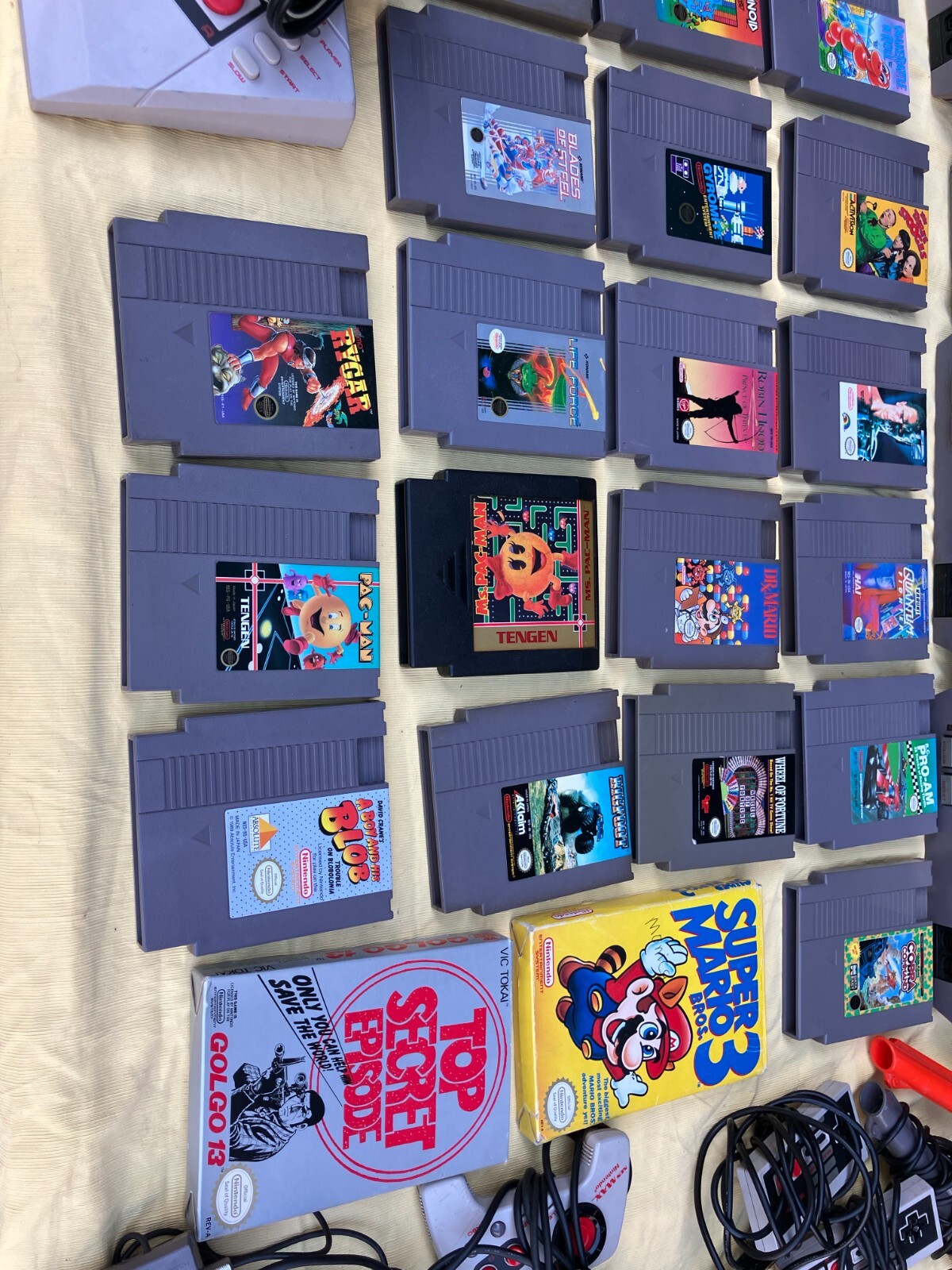 4 NES's, 48 games, 6 controllers, 3 zappers, and game room xtras No