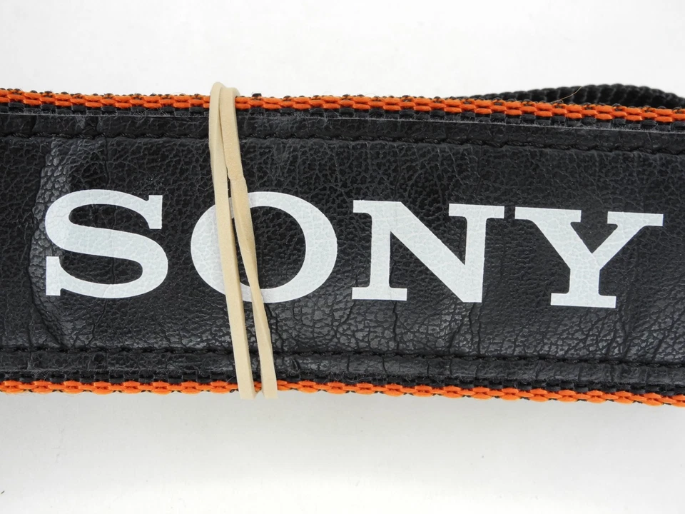 Correa para el cuello para cámara Sony Alpha negra/naranja/blanca 1 5/16" Foto 2 de 4