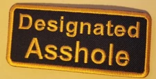 Designated As shole Embroidered Patch approx 1.75X4" orange