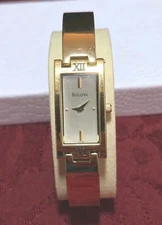 Bulova Watch Gold Tone Band Rectangular Face Roman Numerals. With New Battery.  
