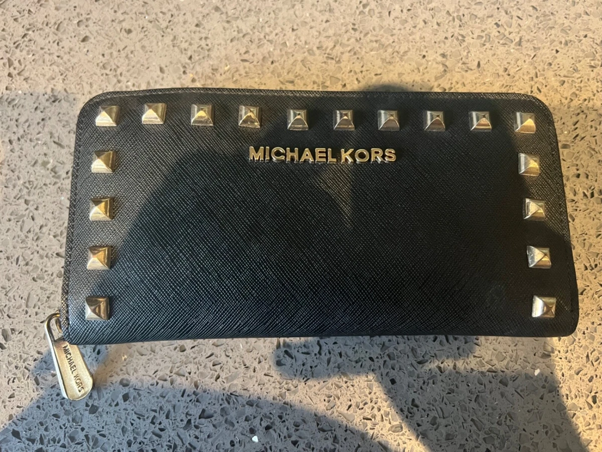 Michael kors black purse with gold studs discount