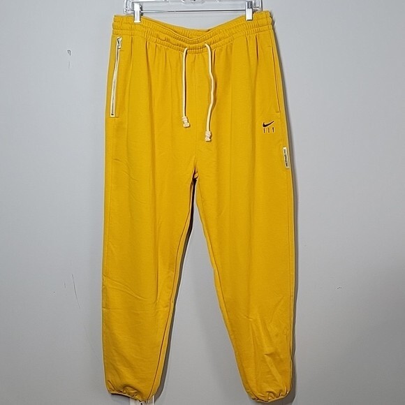 nike yellow tracksuit bottoms