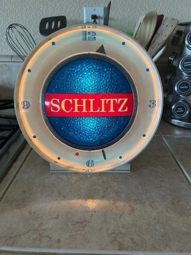 VINTAGE 1961 SCHLITZ BEER MOTION SPINNER CLOCK LIGHT UP SIGN