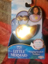 The Little mermaid Live Singing And Light Up Seashell Necklace. Brand New In Box