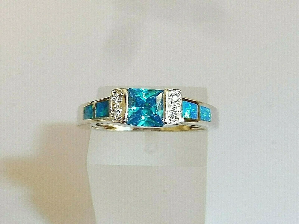 Damenring 925 massiv Silber Princess Cut Aquamarin Solitär mit Opal Akzenten