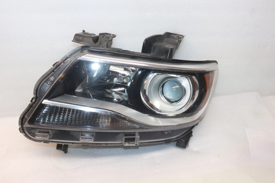 Faro halógeno izquierdo del conductor Chevrolet Colorado 2015-2022 84630991 OEM Foto 2 de 4