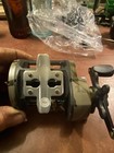 Shakespeare camo bait Caster fishing reel RH New — photo 5