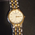 Seiko V701-A090 Quartz Two-Tone White Dial Analog Bracelet Water Resistant