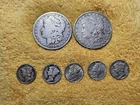 Two Morgan Dollars and Five Mercury Dimes...2.50 Face Value. Free Shipping.