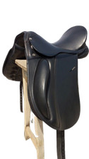 Black dressage leather saddle with tack set matching bridle, stirrup leather,
