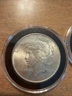 ESTATE LOT OF 4 PEACE SILVER DOLLARS