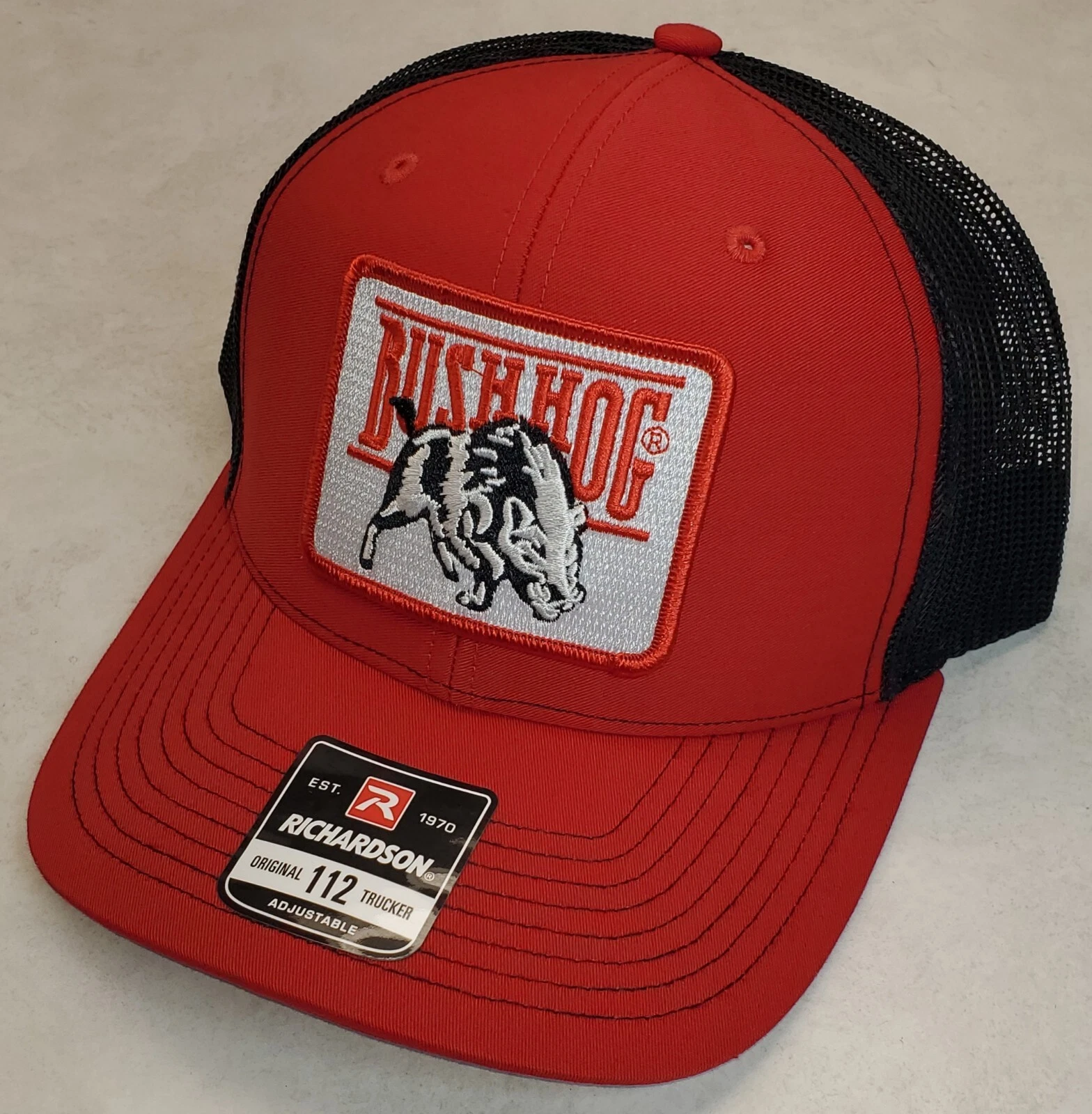 Bush Hog Patch on Richardson 112 Trucker Hat Snapback Red/Black